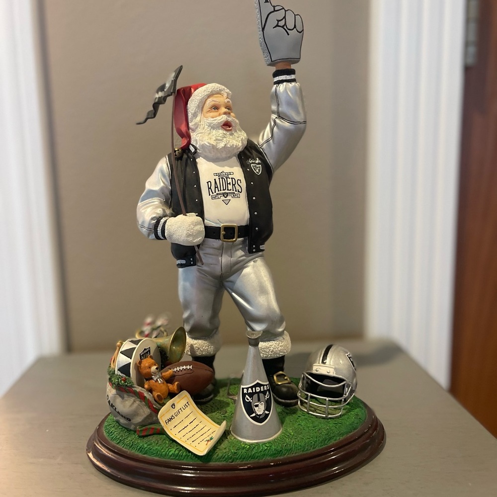 NFL Raiders Santa collectible. The Danbury Mint collection  Excellent condition